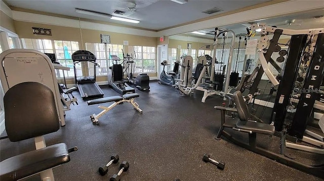 exercise room featuring visible vents and baseboards