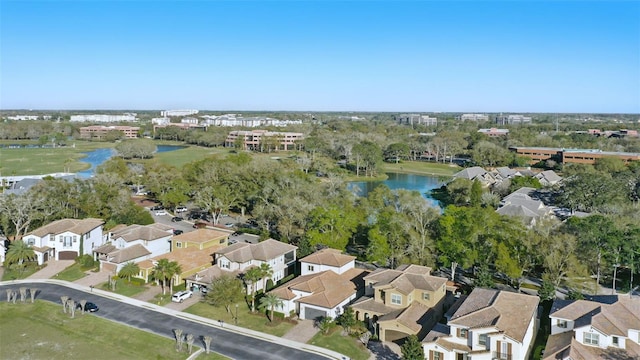 bird's eye view with a water view and a residential view