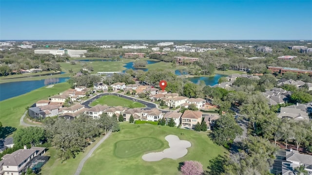 birds eye view of property featuring a water view, a residential view, and golf course view