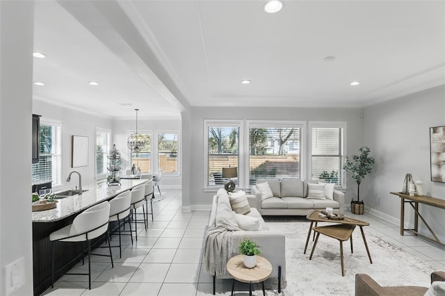 living area with ornamental molding, recessed lighting, baseboards, and light tile patterned floors