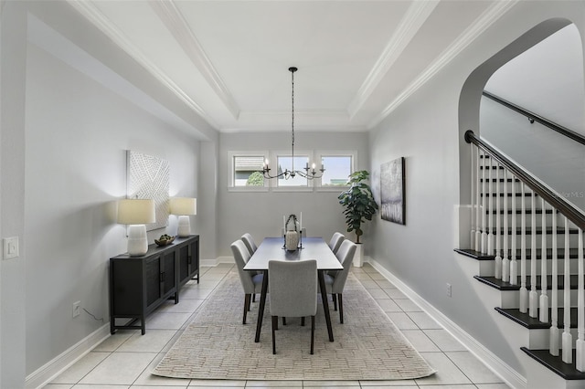 1377 Tappie Toorie Cir, Lake Mary, FL 32746 - dining room with light tile patterned floors, a raised ceiling, stairway, crown molding, and a chandelier