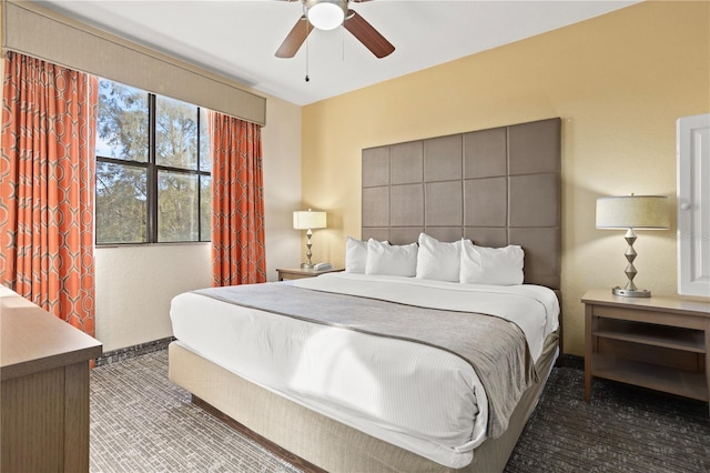 bedroom featuring carpet and a ceiling fan