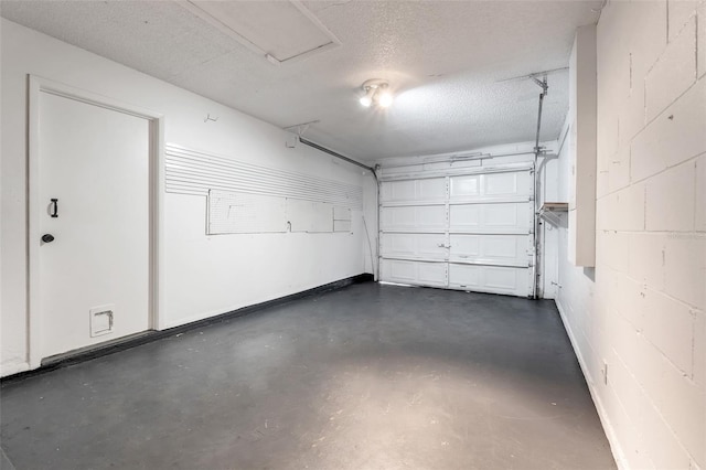 garage featuring concrete block wall