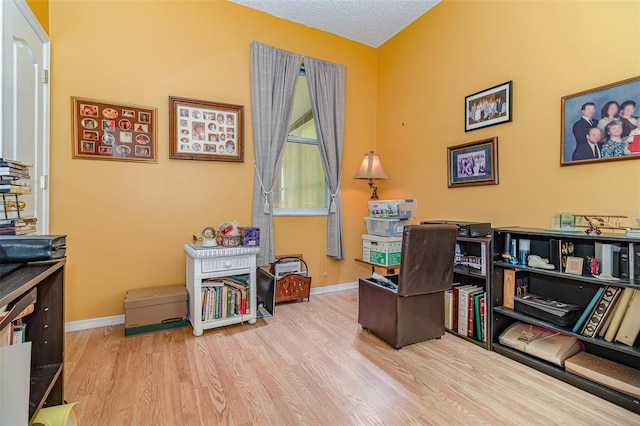 office with wood finished floors and baseboards