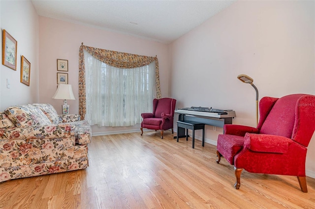 sitting room with wood finished floors