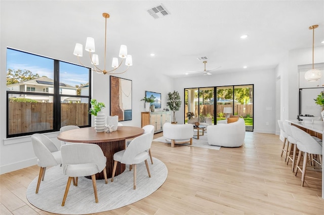 dining area with recessed lighting, visible vents, baseboards, and light wood-style flooring