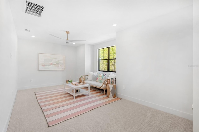 sitting room featuring recessed lighting, visible vents, baseboards, and carpet