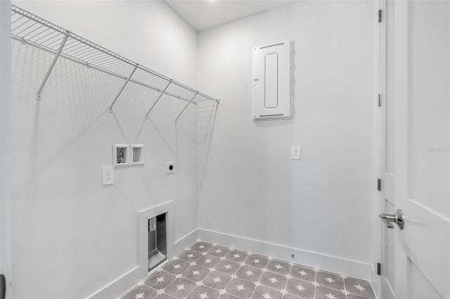 laundry area with baseboards, washer hookup, laundry area, tile patterned floors, and hookup for an electric dryer