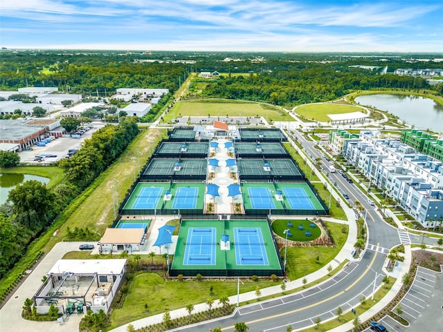 birds eye view of property featuring a water view