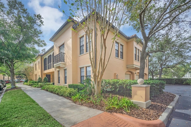 view of property exterior featuring a residential view and stucco siding