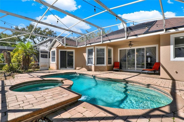 view of swimming pool featuring a lanai, a patio area, and ceiling fan