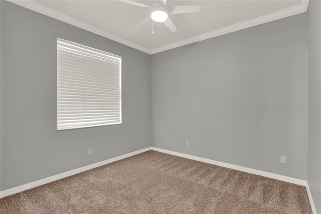 unfurnished room featuring carpet, ornamental molding, and baseboards