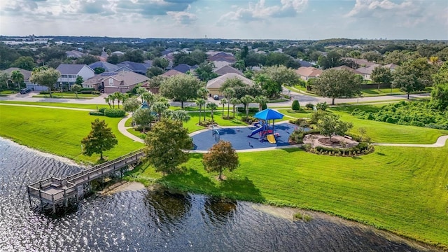 aerial view featuring a water view and a residential view