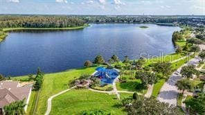 drone / aerial view featuring a water view