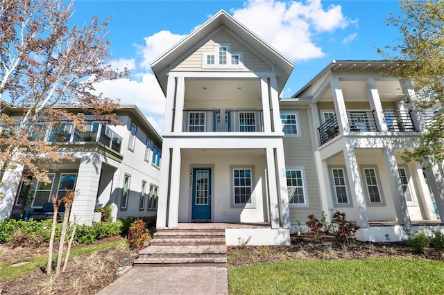 neoclassical / greek revival house featuring a porch