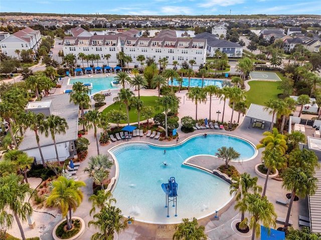 view of pool featuring a residential view