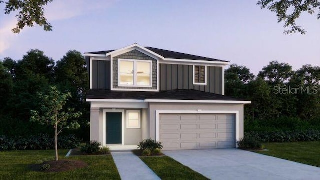 traditional-style house featuring board and batten siding, concrete driveway, and an attached garage