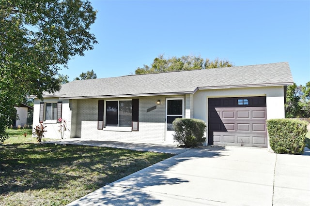 single story home featuring brick siding, a shingled roof, an attached garage, driveway, and a front lawn