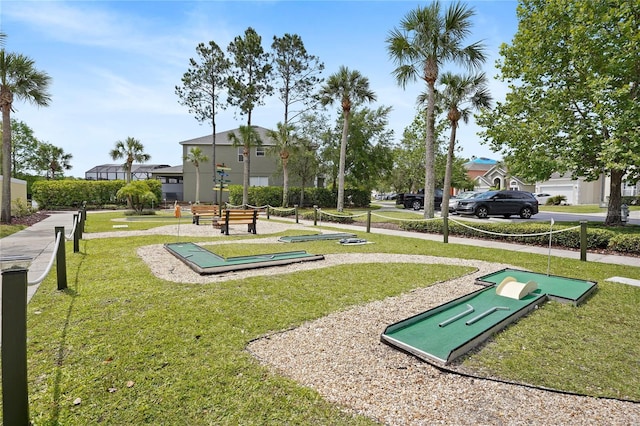 view of home's community featuring a lawn