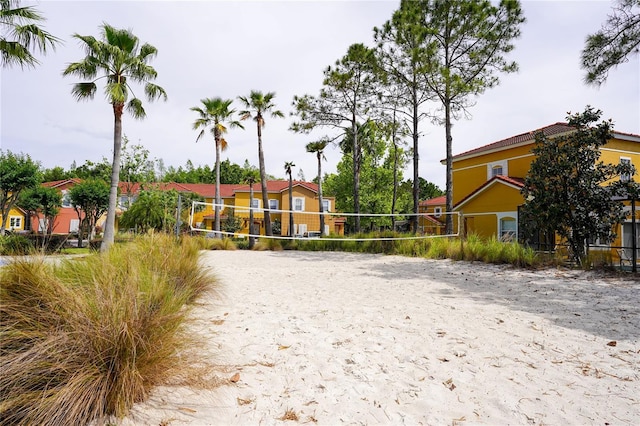 surrounding community featuring volleyball court