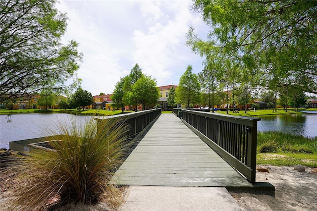 view of community with a water view