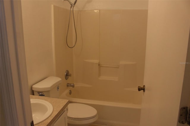 full bathroom with shower / tub combination, vanity, and toilet