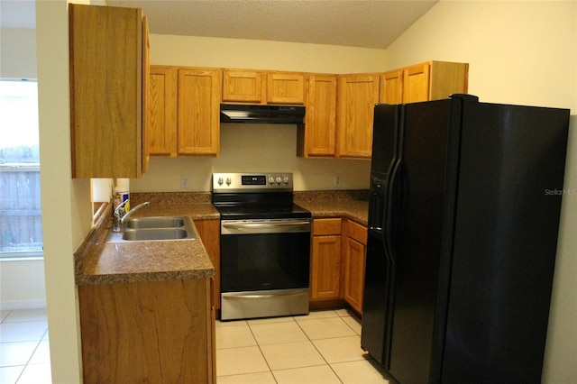 kitchen with light tile patterned floors, stainless steel electric range, black refrigerator with ice dispenser, under cabinet range hood, and a sink