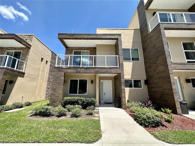 view of front of home featuring stucco siding