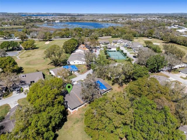 aerial view featuring a residential view and a water view