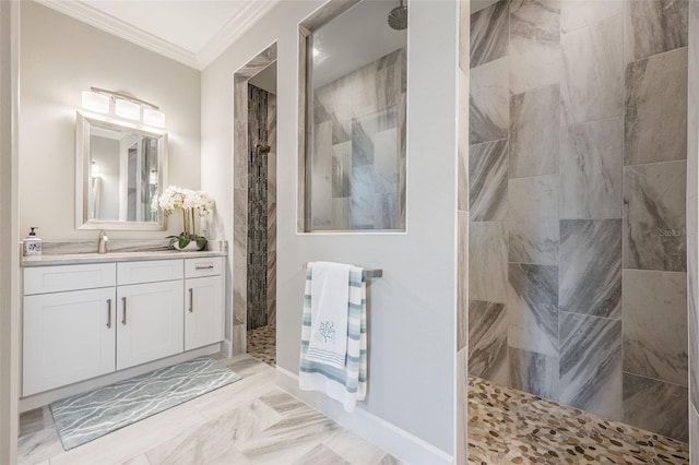 bathroom featuring walk in shower, vanity, and crown molding