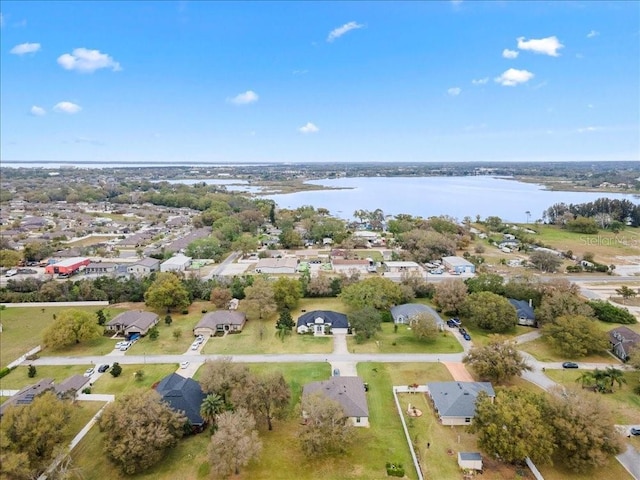 birds eye view of property featuring a residential view and a water view