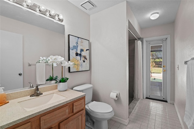 full bath featuring vanity, a shower with shower curtain, baseboards, tile patterned floors, and toilet