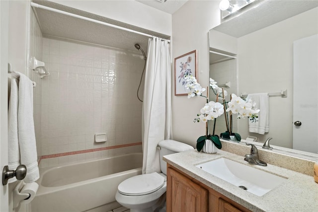 bathroom with vanity, toilet, and shower / bath combo with shower curtain