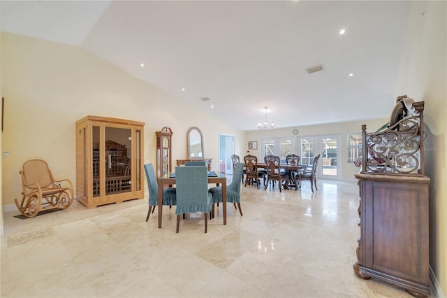 dining space with a chandelier, visible vents, high vaulted ceiling, and baseboards