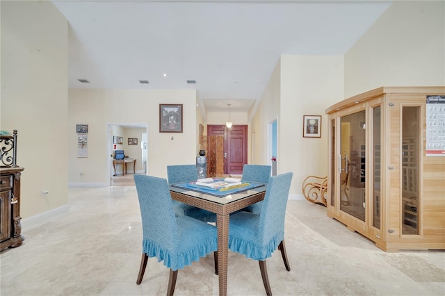 dining space with visible vents and baseboards