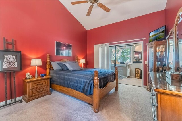 bedroom featuring a ceiling fan, carpet, vaulted ceiling, and baseboards