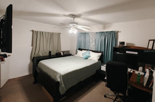 carpeted bedroom featuring a ceiling fan