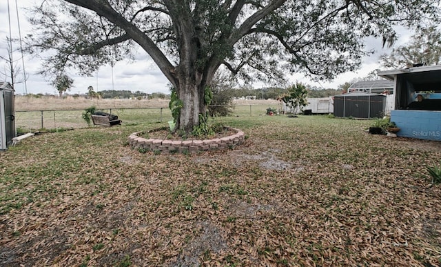 view of yard featuring fence