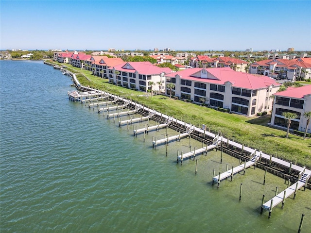 aerial view featuring a residential view and a water view