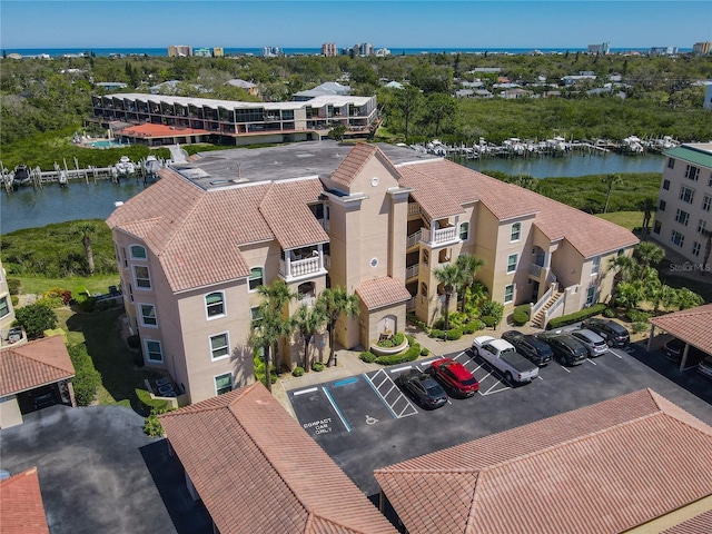 drone / aerial view with a water view