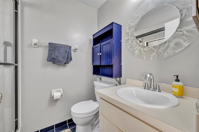 full bathroom featuring a shower with shower door, vanity, and toilet