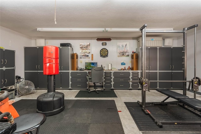 exercise area with a textured ceiling