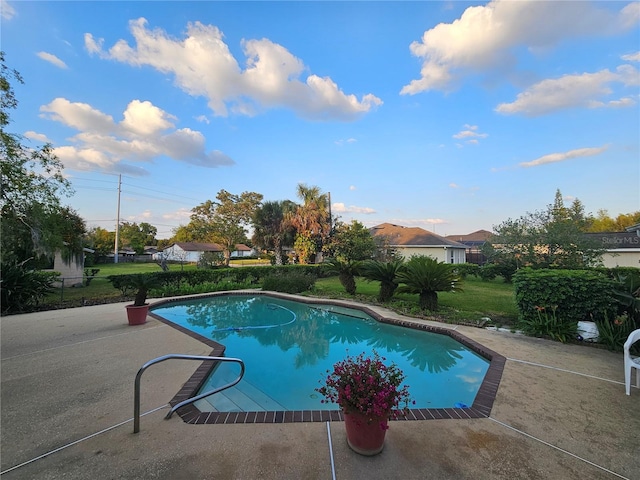 outdoor pool featuring a patio area