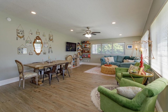 living area with recessed lighting, baseboards, light wood-style flooring, and ceiling fan