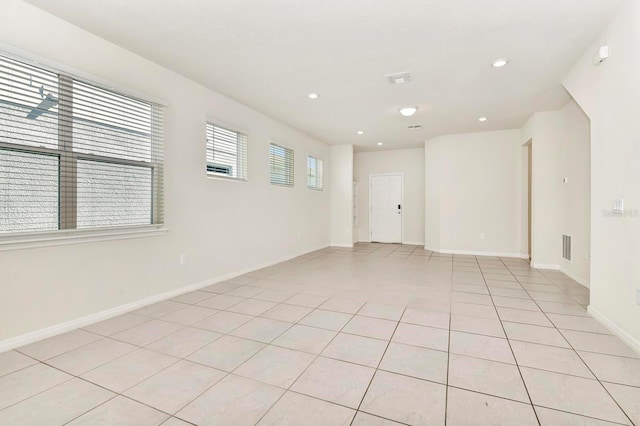 spare room featuring recessed lighting, visible vents, baseboards, and light tile patterned floors