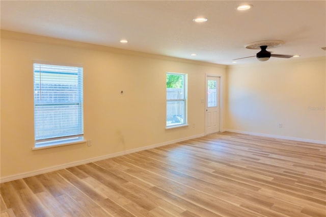 unfurnished room featuring baseboards, light wood-style flooring, recessed lighting, ornamental molding, and ceiling fan