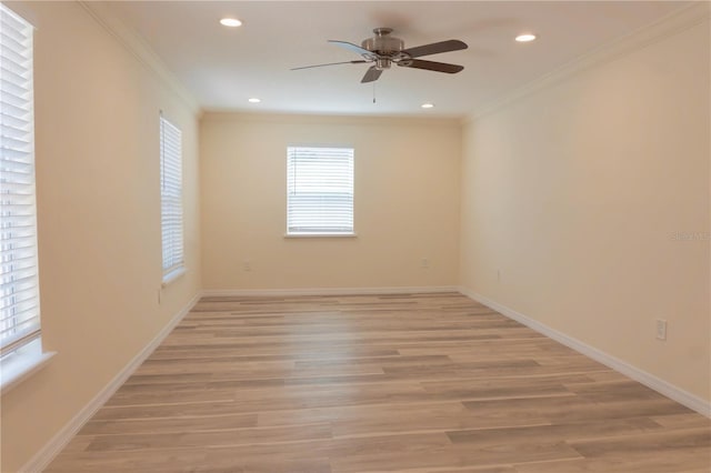 spare room featuring crown molding, recessed lighting, light wood-style floors, and ceiling fan