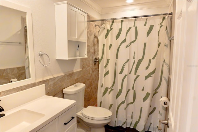 full bathroom featuring vanity, a shower with curtain, crown molding, toilet, and tile walls