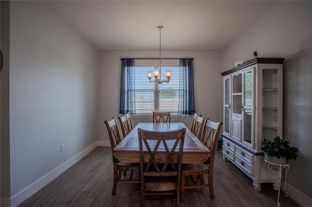 2720 Bancroft Blvd, Orlando, FL 32833 - dining space with baseboards, a notable chandelier, and dark wood-style flooring