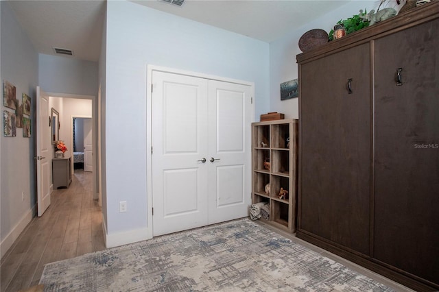 2720 Bancroft Blvd, Orlando, FL 32833 - bedroom featuring light wood-type flooring, a closet, baseboards, and visible vents